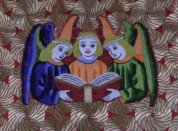 Three colourful embroidered angels singing from a hymnal.