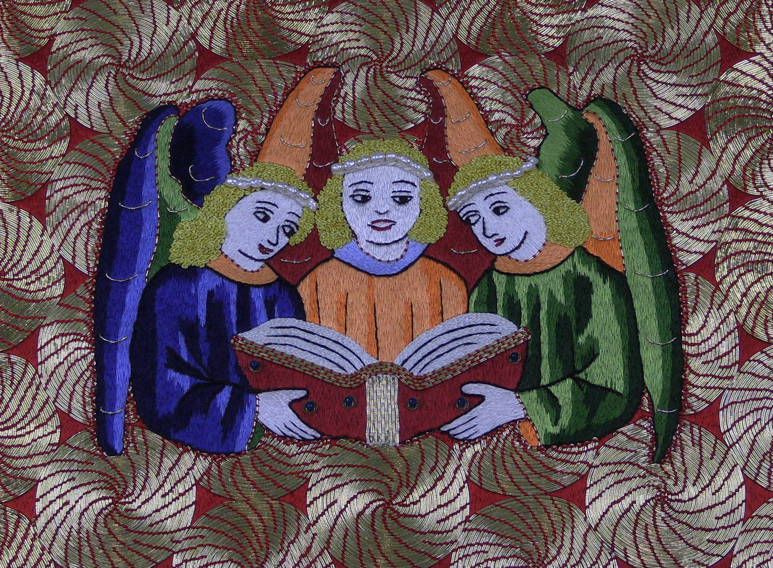 Three colourful embroidered angels singing from a hymnal made by the Acupictrix - Dr Jessica Grimm.