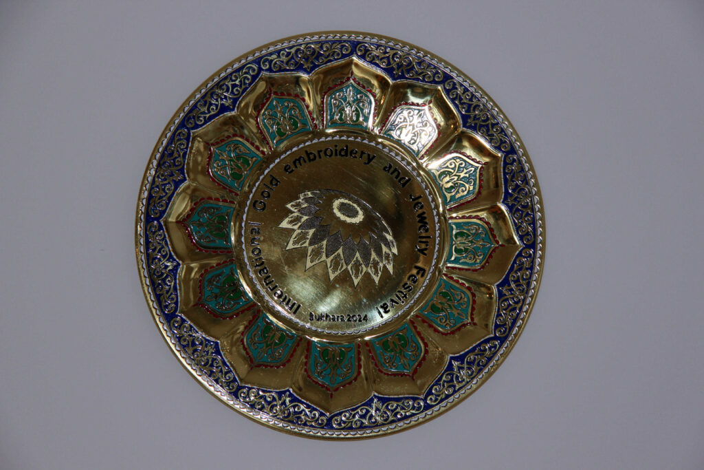 Decorative metal board trophey for winning with my Medieval Goldwork Embroidery in Uzbekistan.