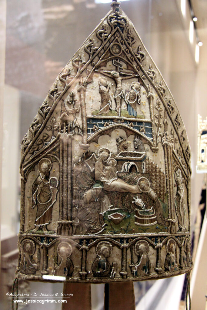 Pearl-embroidered mitre Sainte-Chapelle showing nativity scene.