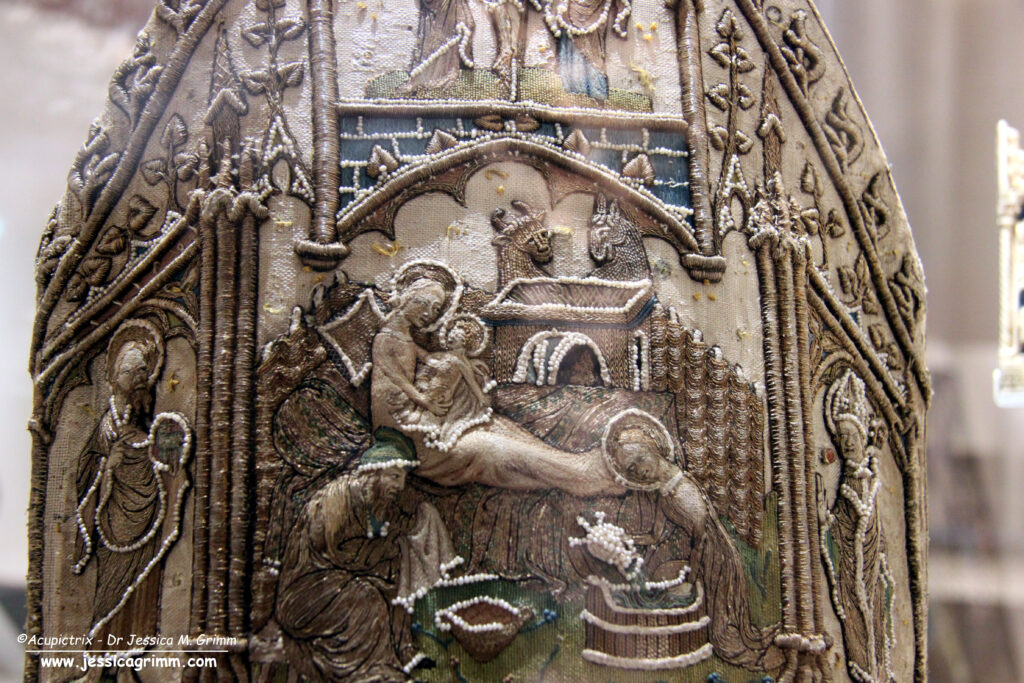 Pearl-embroidered mitre Sainte-Chapelle showing nativity scene.