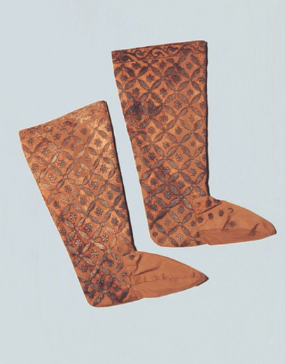 Embroidered pontifical stockings found in the grave of Bishop Beringer von 