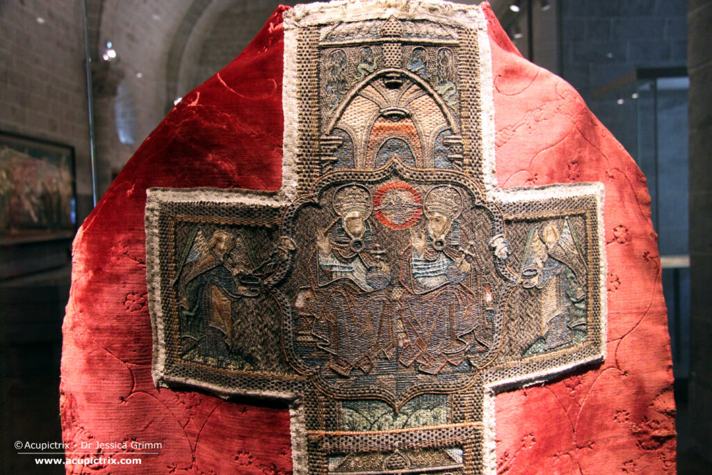 Trinity on the back of chasuble 1212.BL115 Cathedral Traesury Le Puy-en-Velay, France