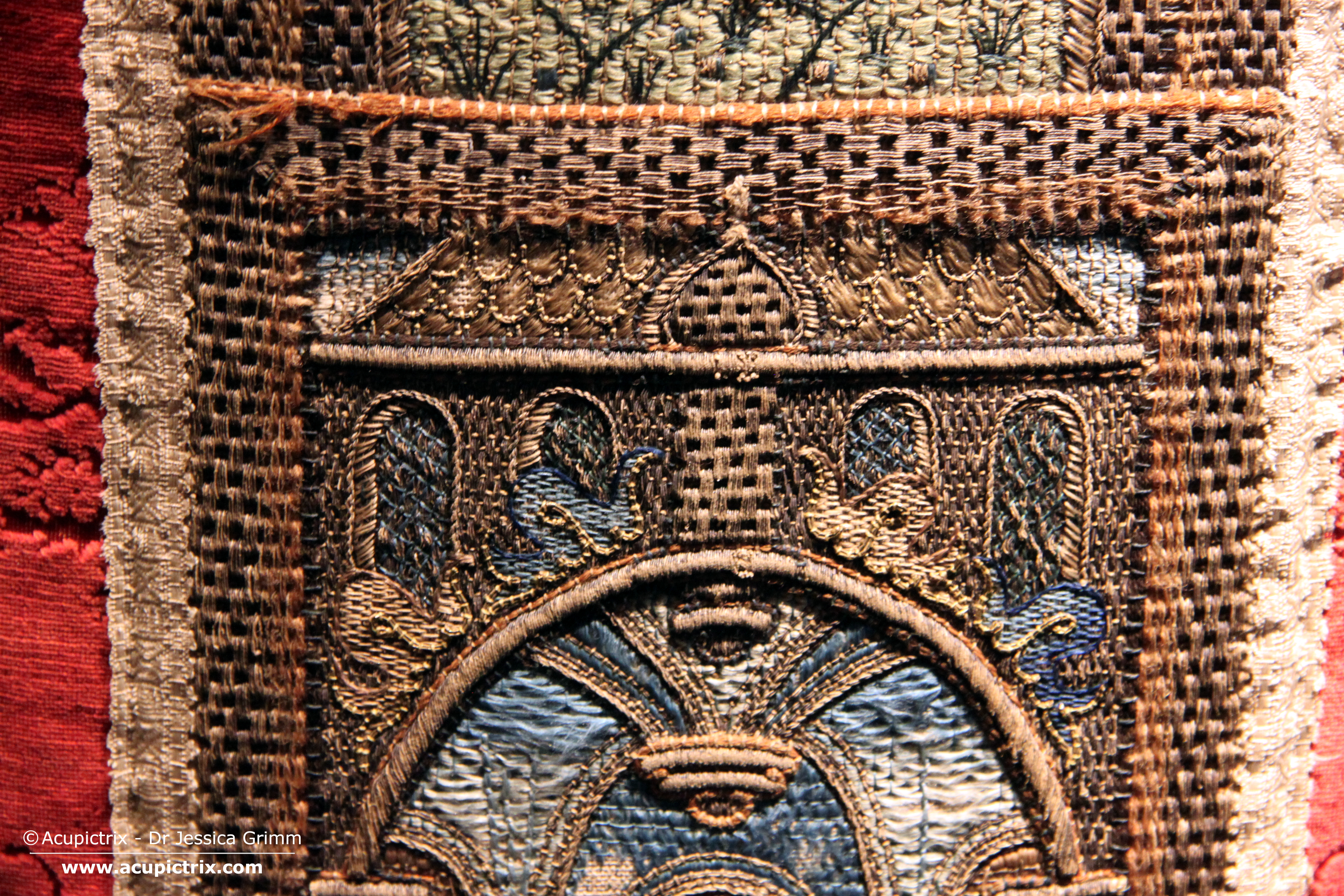 Detail of the orphrey with Catherine of Alexandria on the front of chasuble 1212.BL115 Cathedral Traesury Le Puy-en-Velay, France