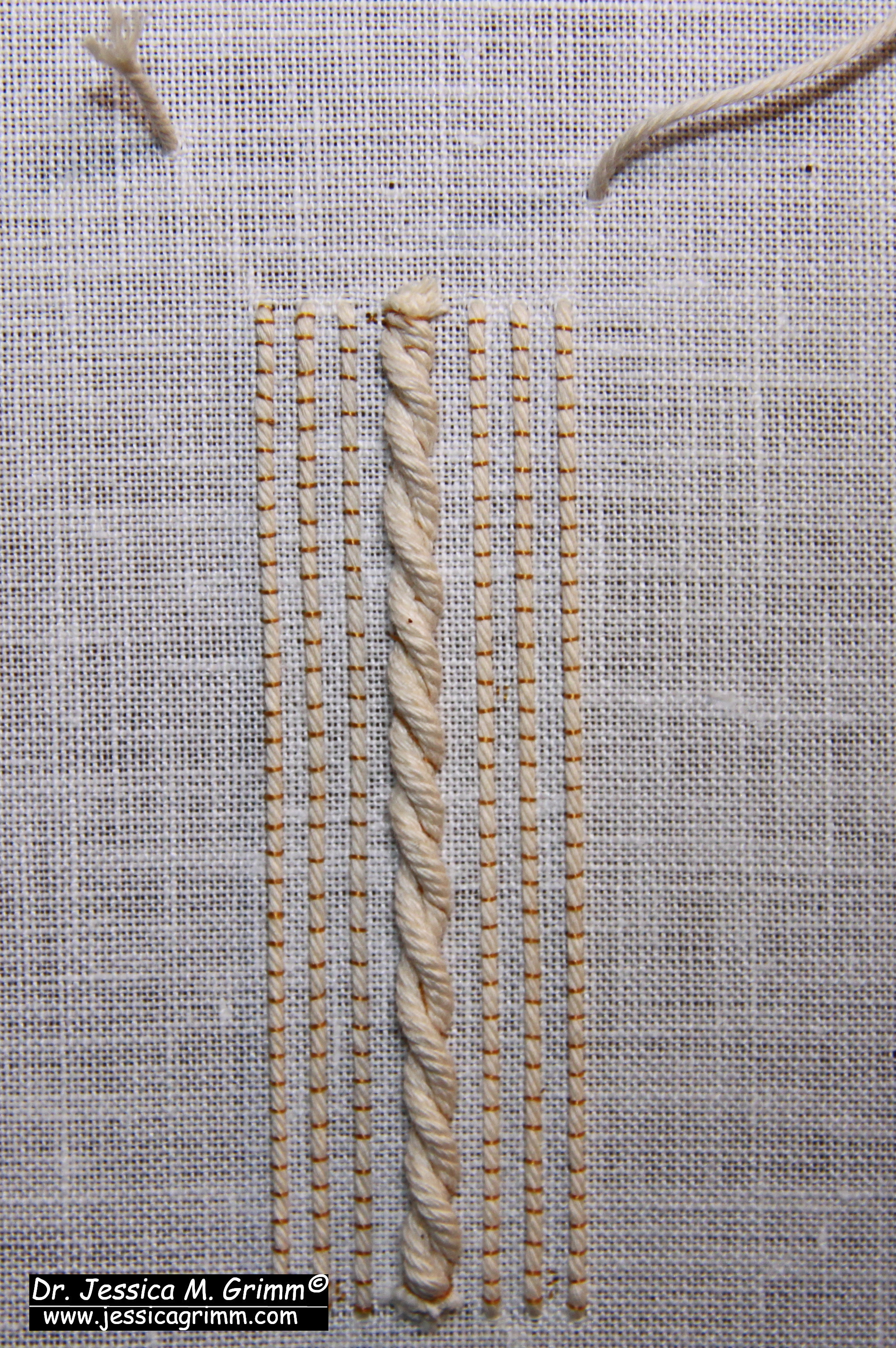 Goldwork Tutorial - String padding couched down and ready for the gold threads.