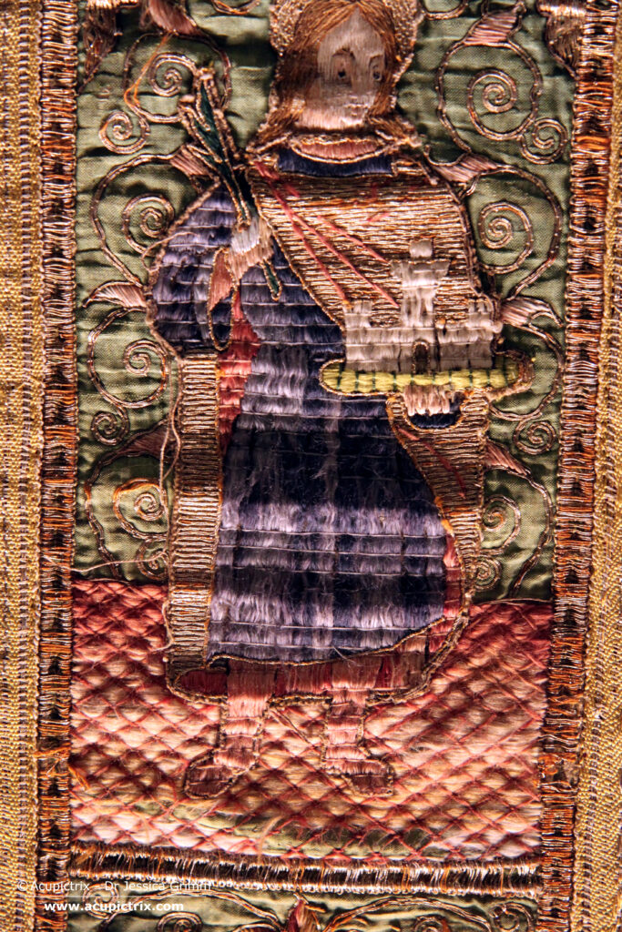 Embroidery - Detail orphrey panel with the male martyr on the chasuble from the parish church of Saints Philip the Apostle and James the Apostle, Azzone (Bergamo), Italy