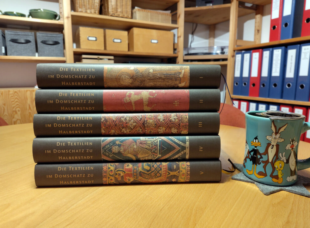 Halberstadt - a stack of books on a table