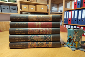 Halberstadt - a stack of books on a table