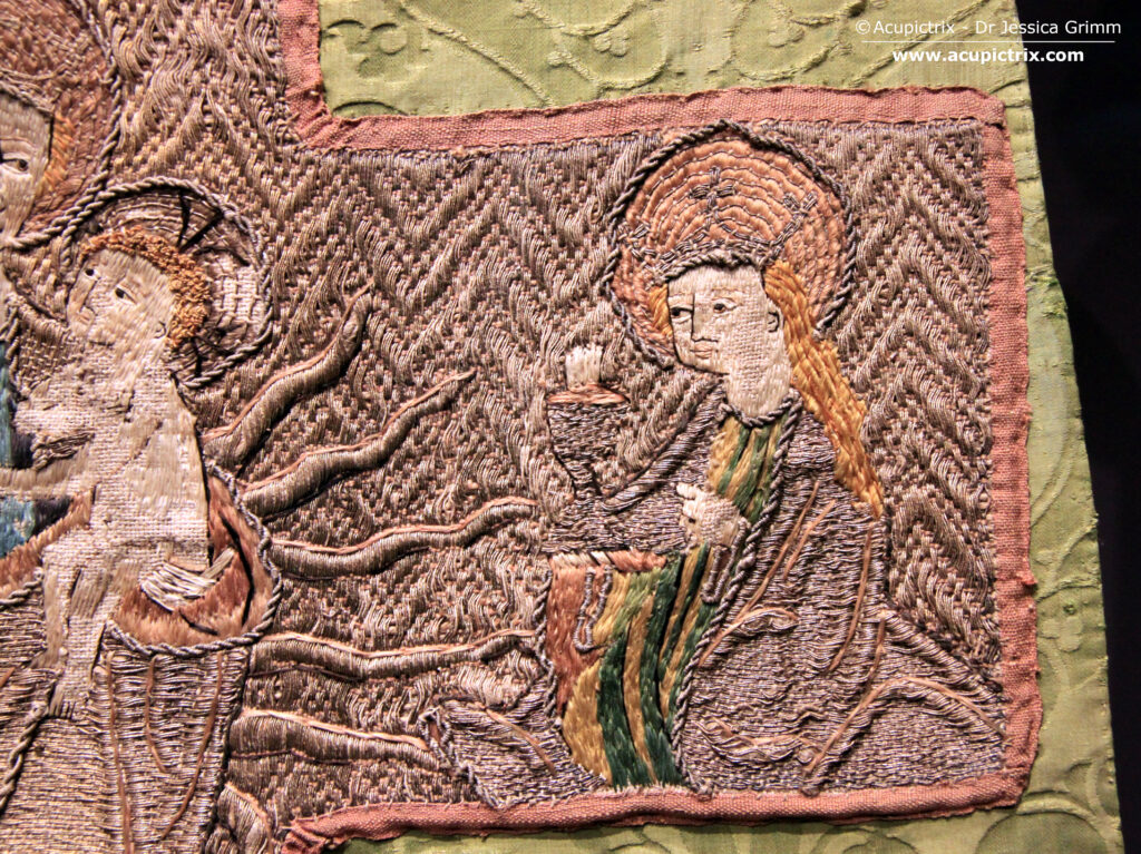 Domschatz Fritzlar - detail of medieval embroidery on a green chasuble