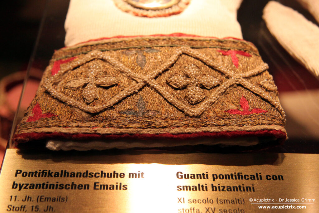 Diocesan Museum Brixen - gold and silk embroidered pontifical glove with museum caption