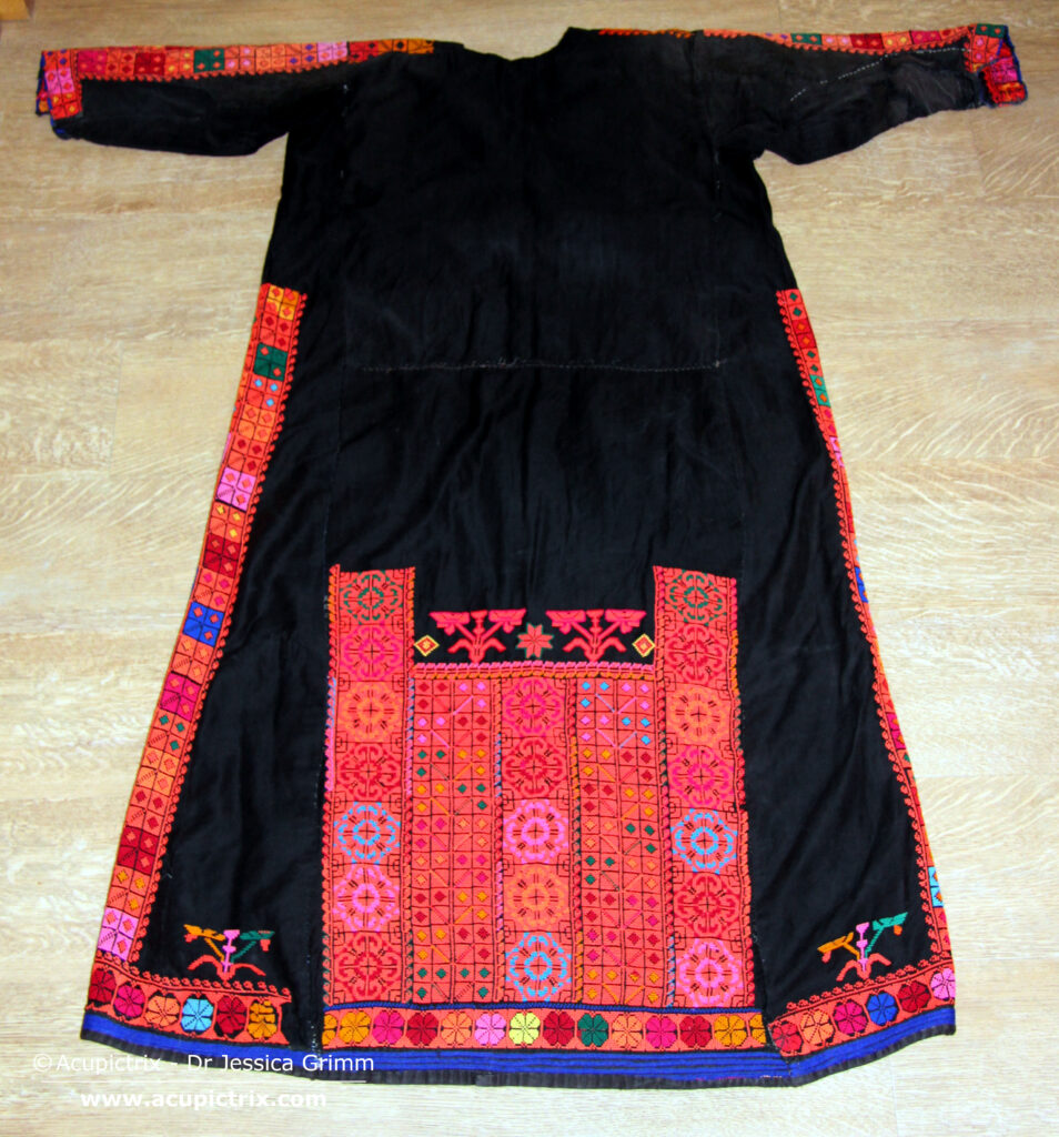 Fallahi embroidery - black Bedouin dress with colourful crossstitch embroidery