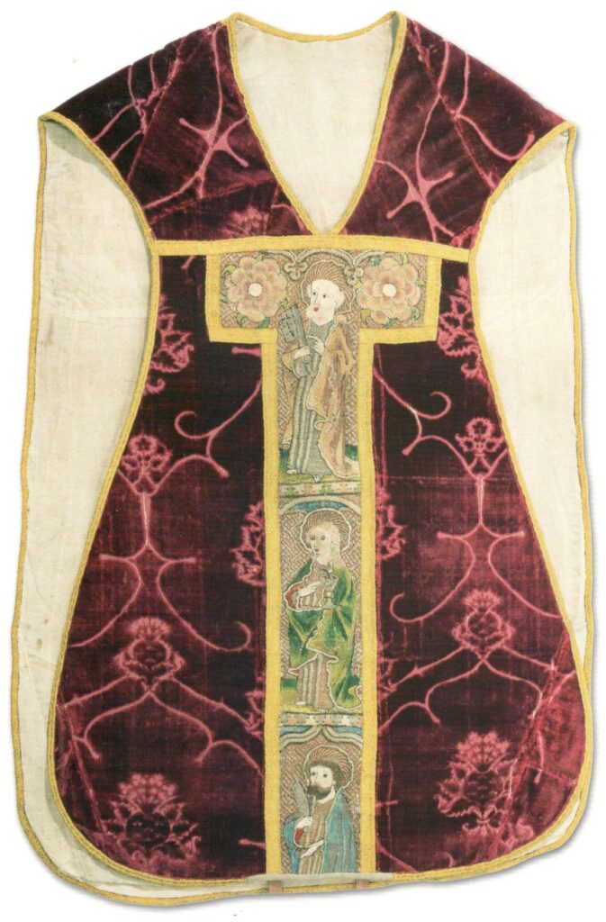 Medieval goldwork - multicoloured embroidered cross on a red chasuble