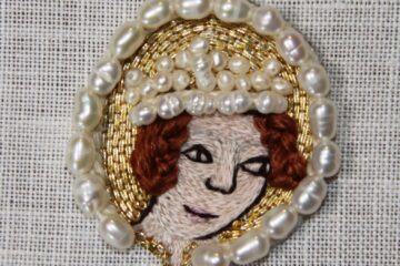 Embroidery Tutorial - partly finished sample of a female embroidered head