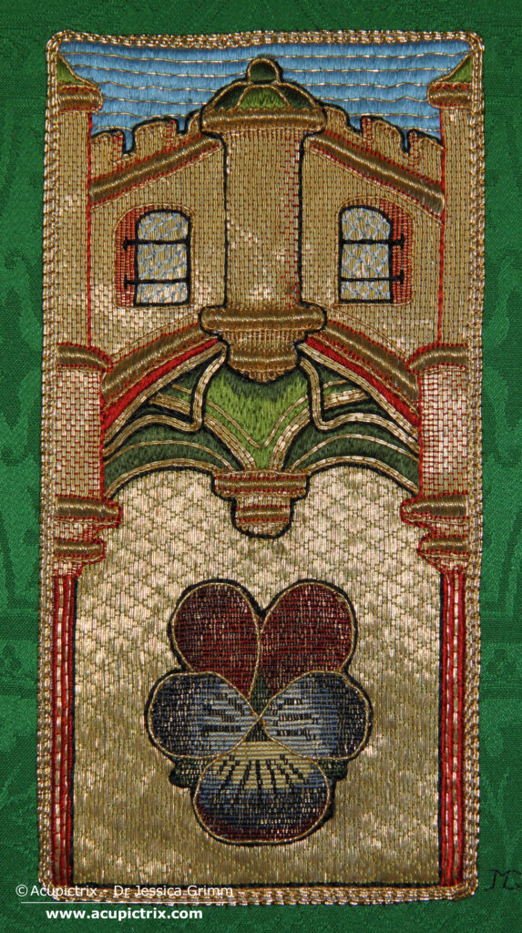 Goldwork Course - multi-coloured embroidery featuring a pansy on a golden background underneath a green vault and a blue sky.