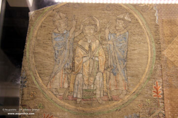 Opus anglicanum - embroidered scene with two men blessing a bishop