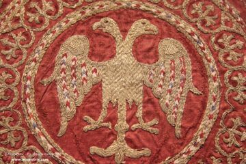 Opus cyprense - detail with gold embroidered double-headed eagle on red silk