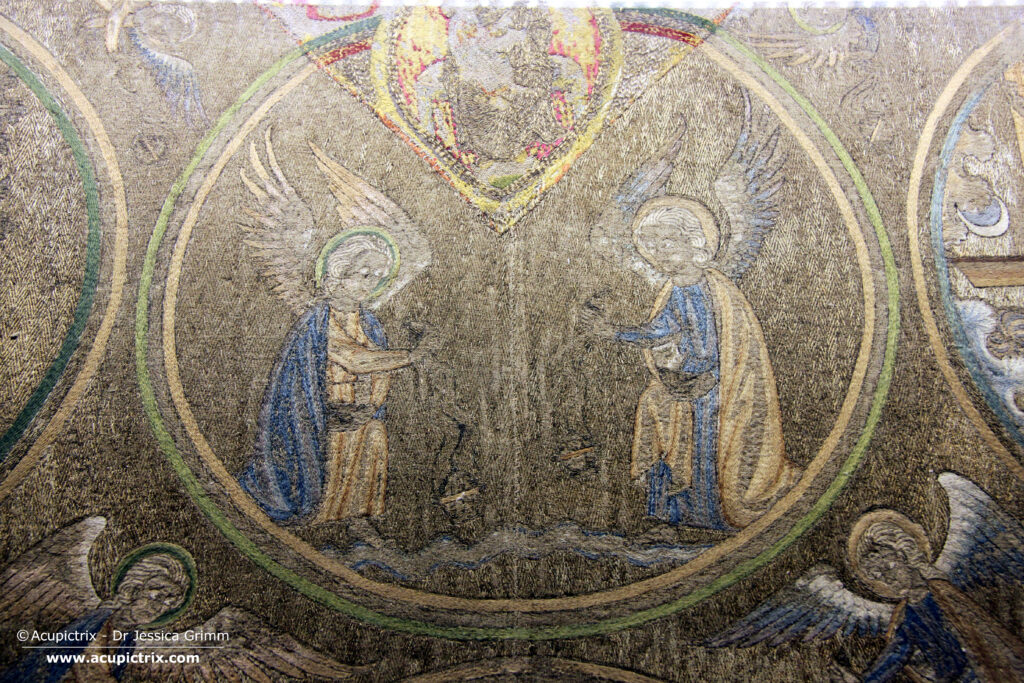 Opus anglicanum - multi coloured embroidery showing two angels